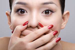 Причины  неприятного запаха изо рта